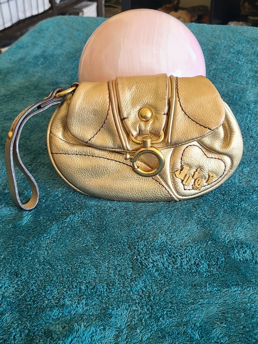 Y2K vintage metallic gold leather Juicy Couture wristlet featuring Heart Accent